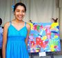Artista de 13 años con su obra en oleo sobre tela de estilo propio en la exposicion Los Colores del Mar en el Hotel Mocambo veracruz