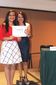 La Mtra. de Pintura Rocio Aguilera hace entrega del diploma a uno de los alumnos del Taller de Pintura Creando Artistas como fin de ciclo 2014-15 en el WTC, Veracruz