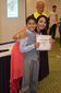 La Mtra. de Pintura Rocio Aguilera hace entrega del diploma a uno de los alumnos del Taller de Pintura Creando Artistas como fin de ciclo 2012-13 en el Hotel Camino Real, Veracruz